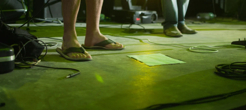 people standing on stage while they do some sort of musical