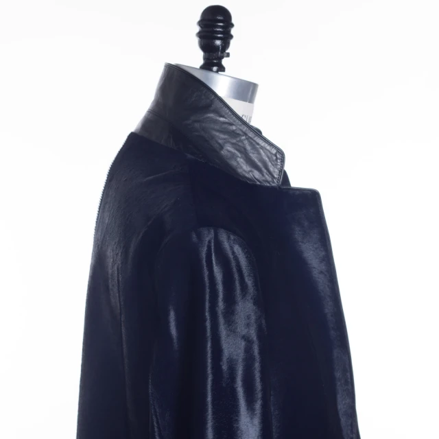 a black jacket with the collar of it and a metal collar