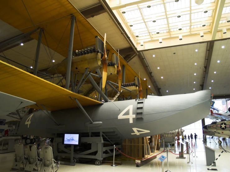 there is a military plane on display in the museum