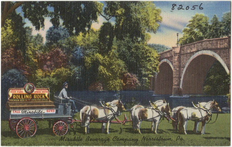 the carriage is pulled by two horses near a bridge