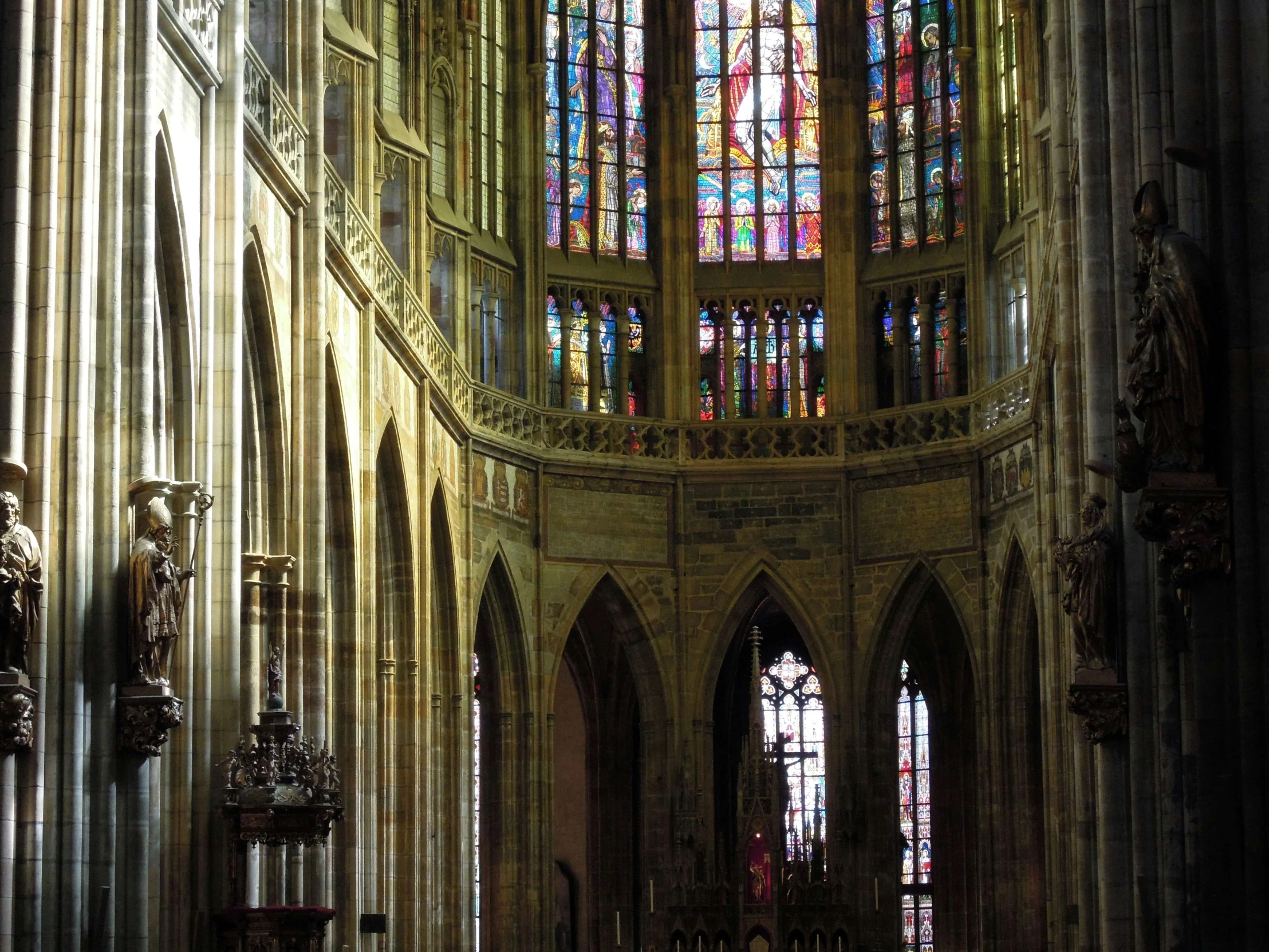 a large, very tall cathedral has stained glass windows