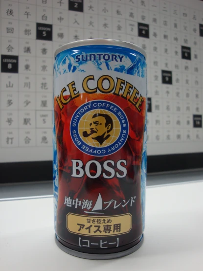 a can of iced coffee with a business advertit on the side