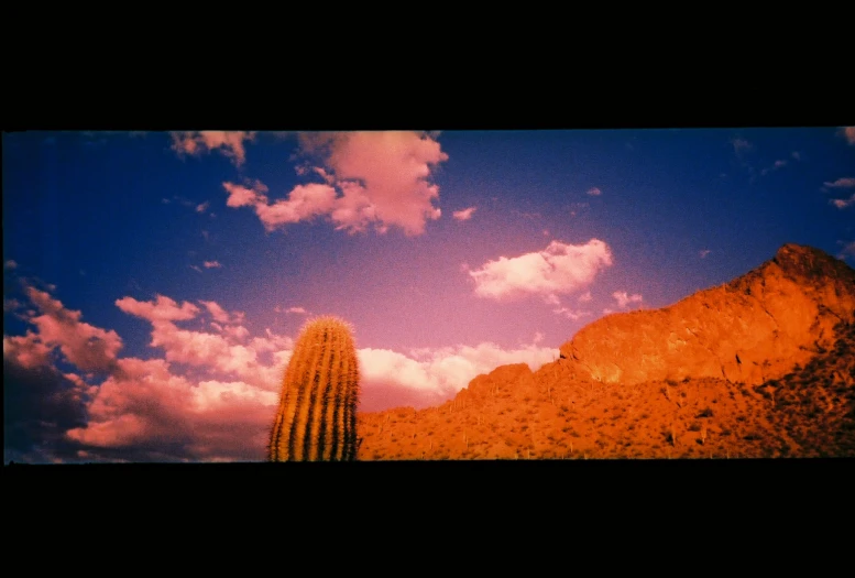 this is the sky and the ground with clouds over a desert