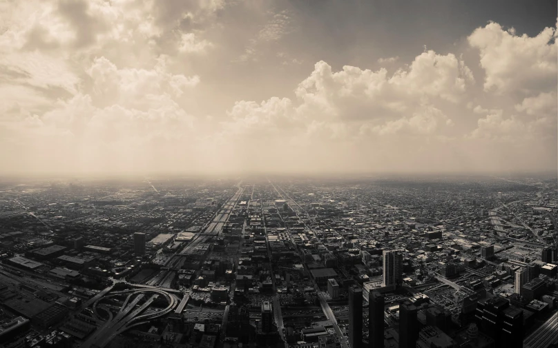 a city skyline is shown in black and white