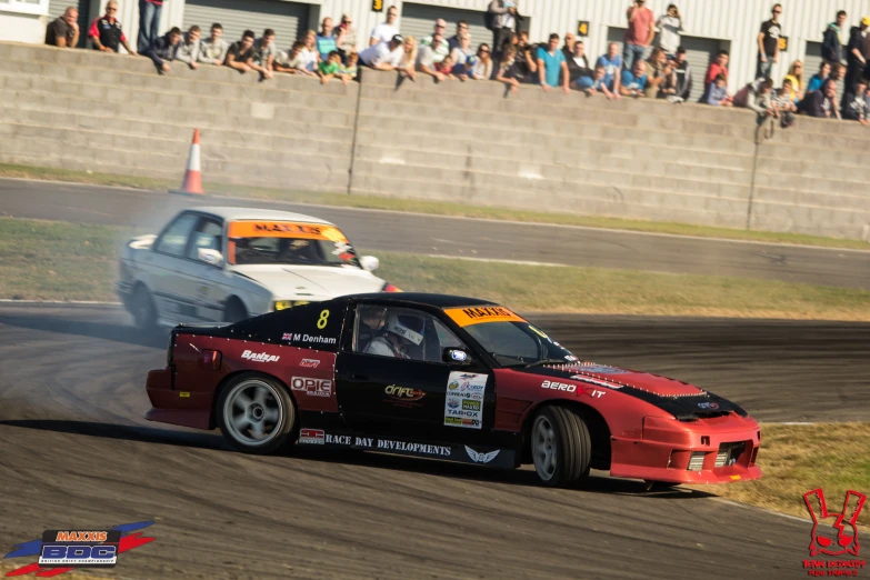 two racing cars in an extreme racing track