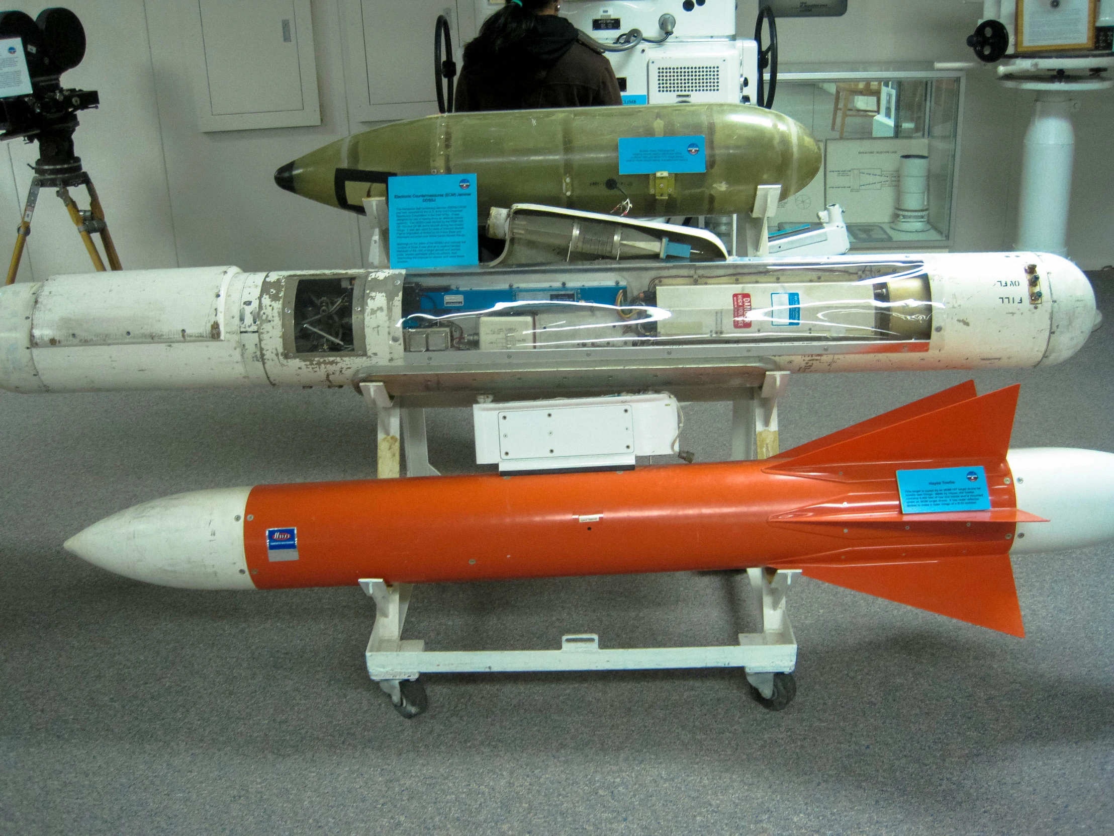 a close up of two missiles with other items around them