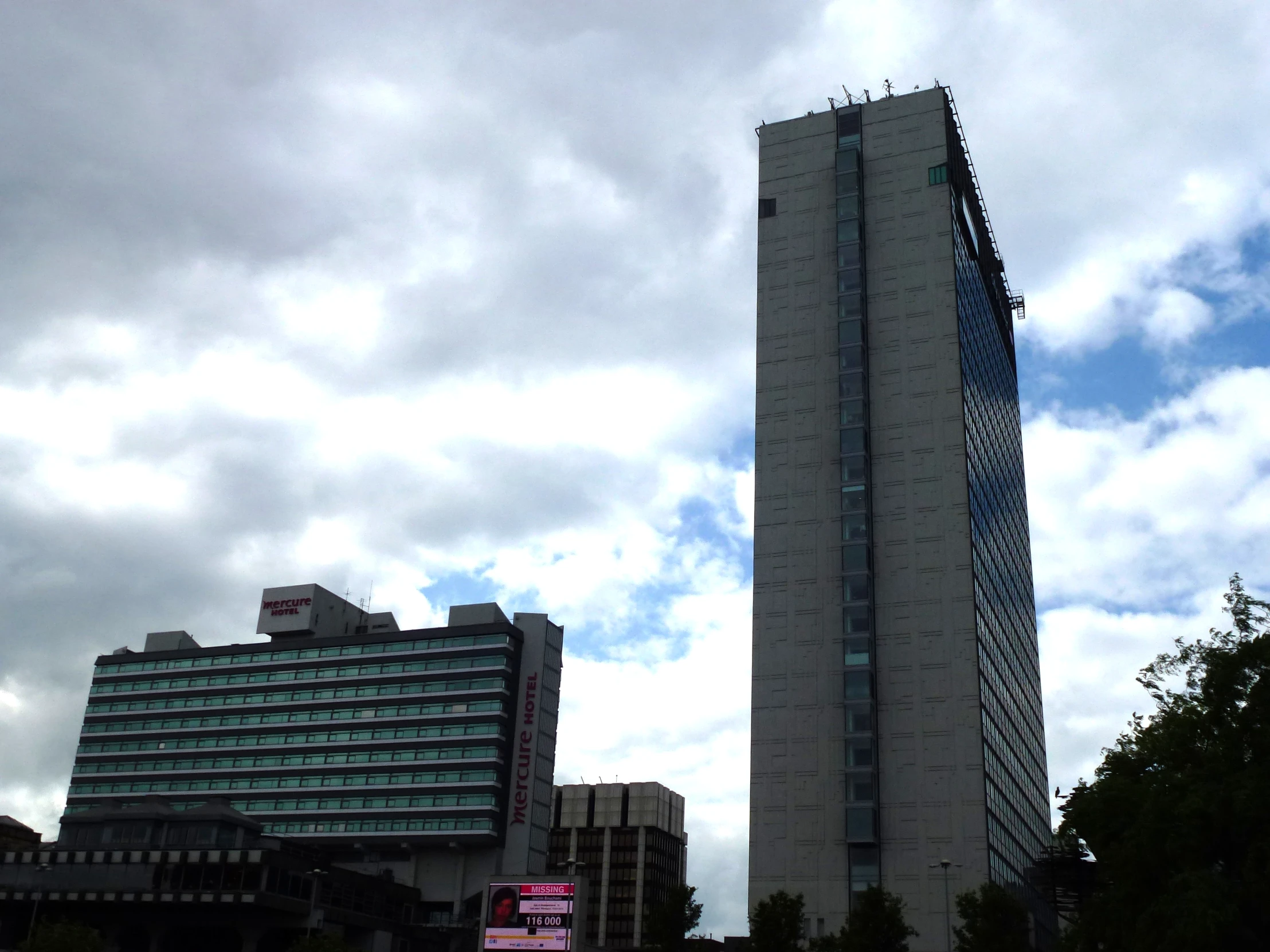 some buildings that are sitting in the grass