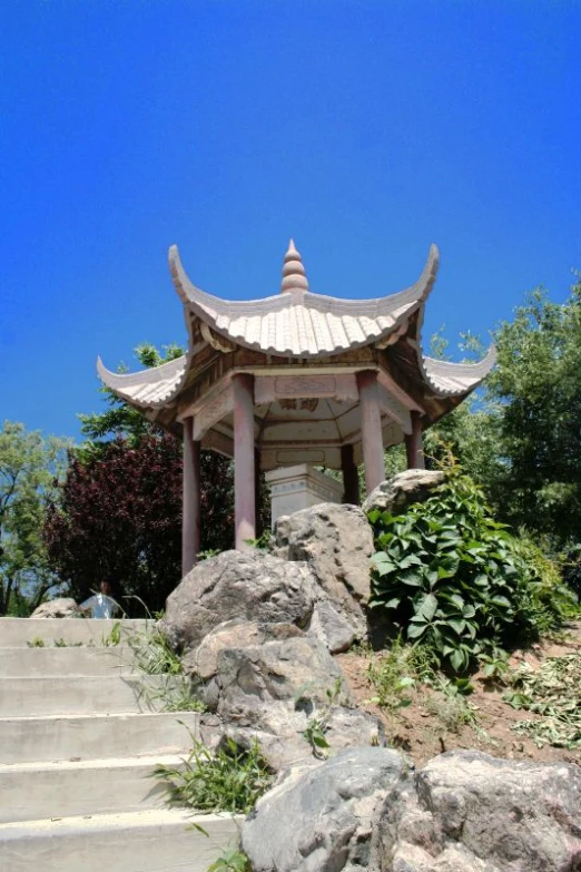 this pagoda stands in the center of the garden