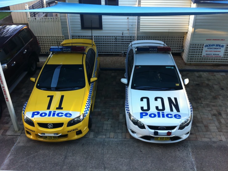 two police cars are shown side by side