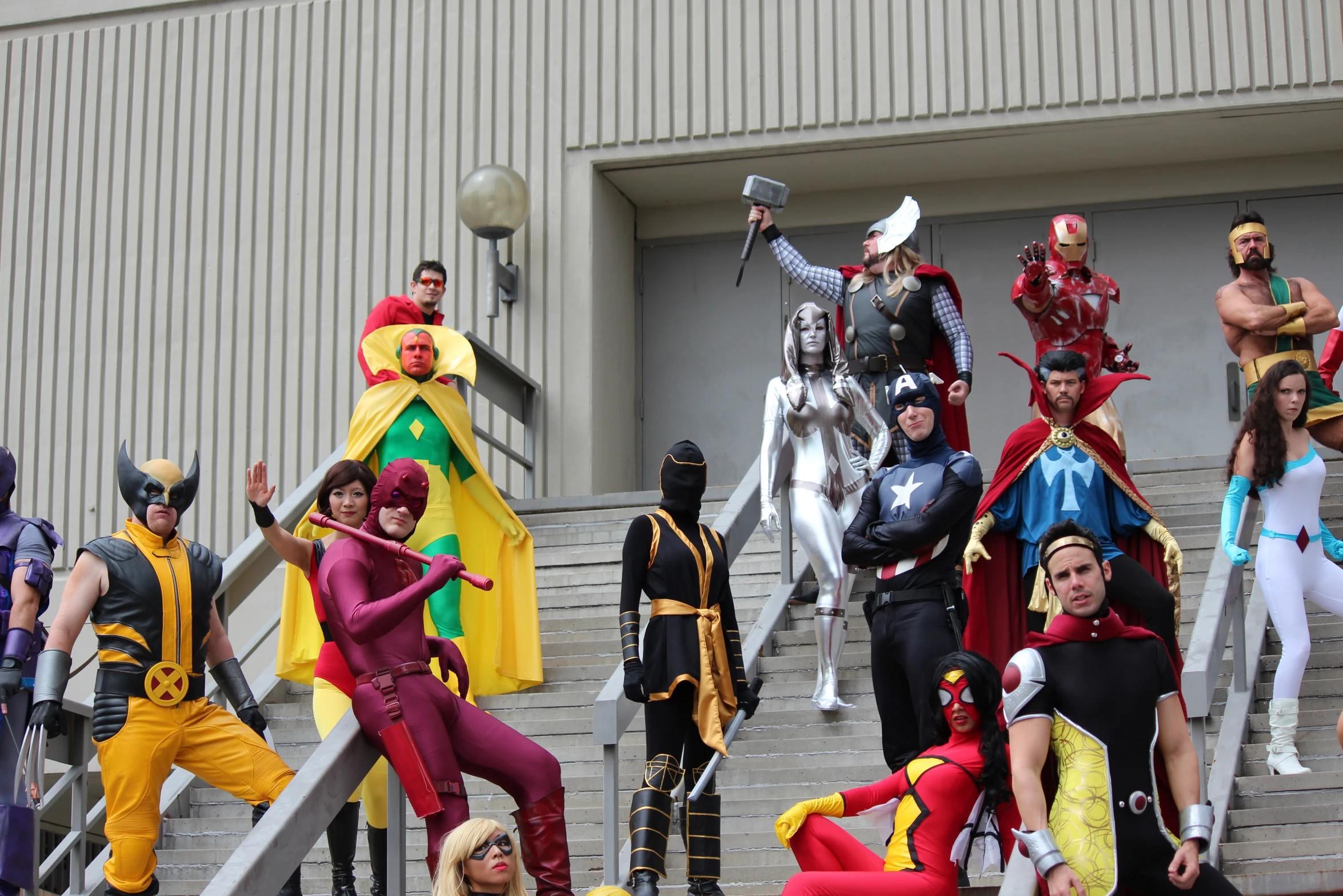 a bunch of people that are dressed up as people on stairs