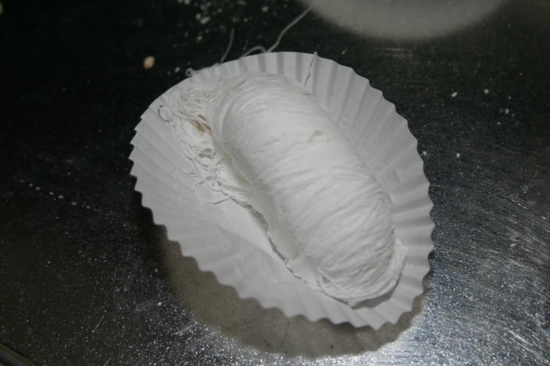 a white plate containing some type of substance in it