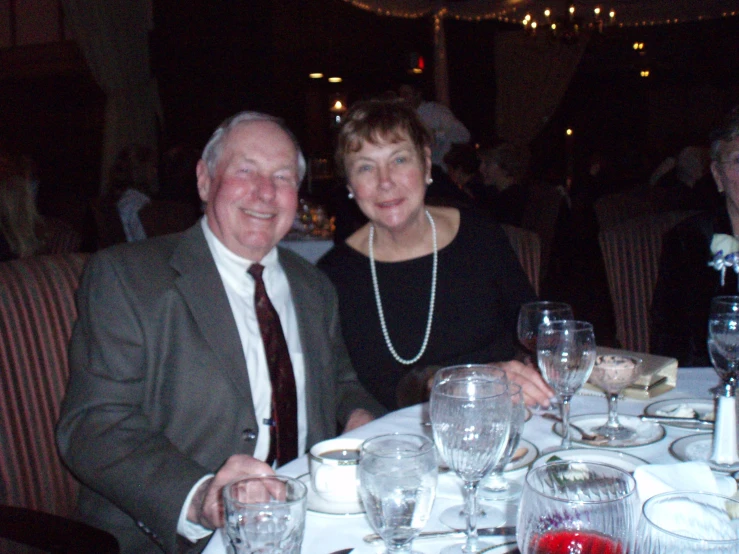 a man and a woman seated at a table