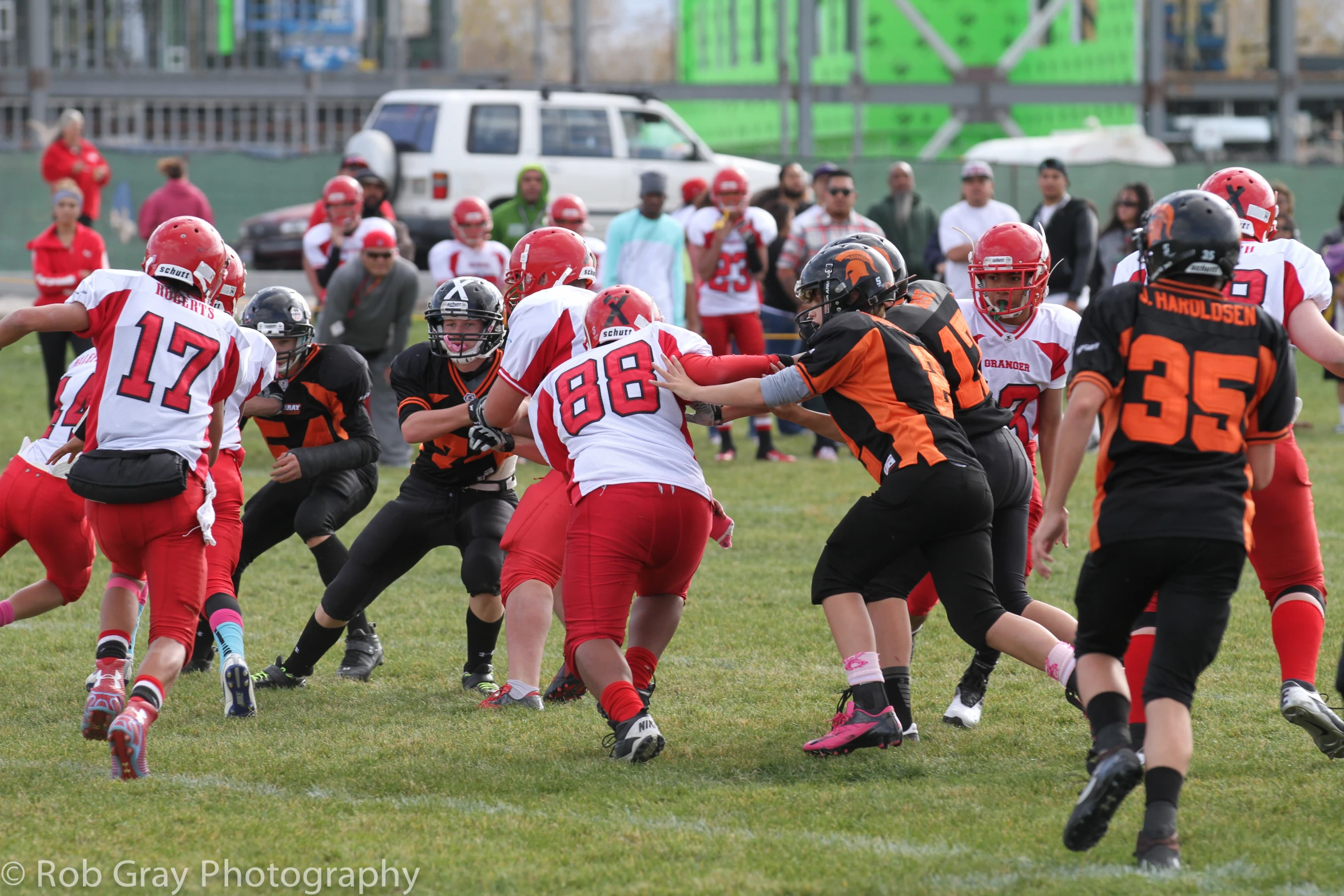 young football players fight with each other in a game