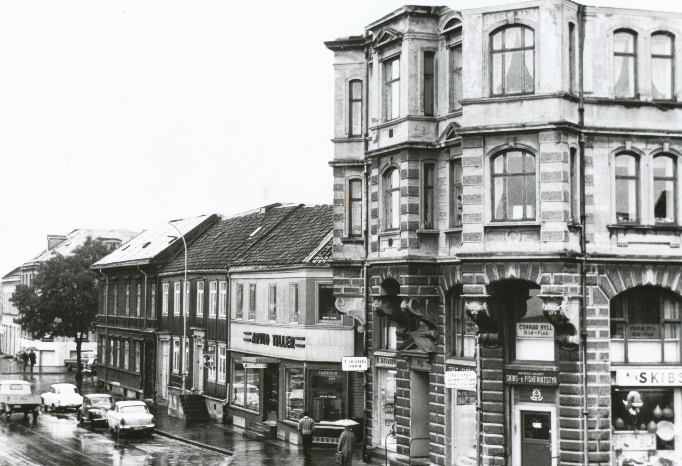 a black and white po of a city with old buildings