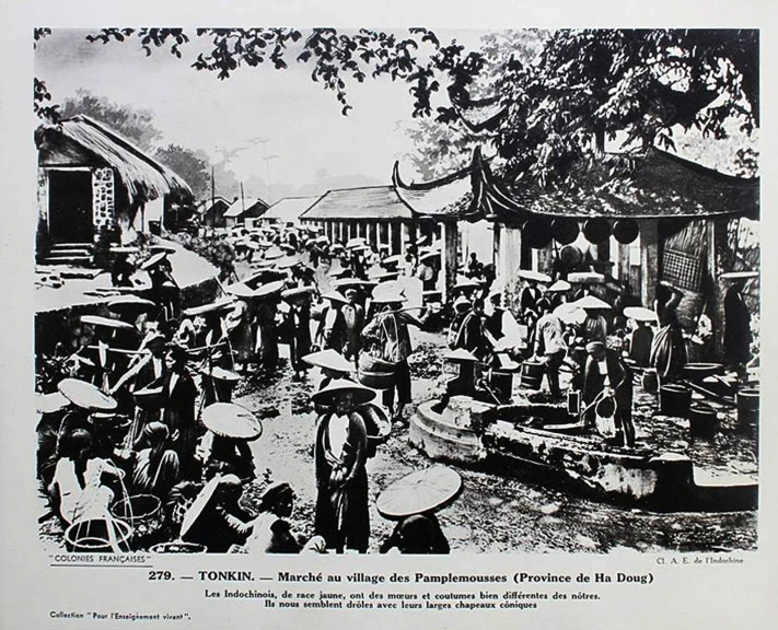 people on boat with umbrellas gather around a small pond