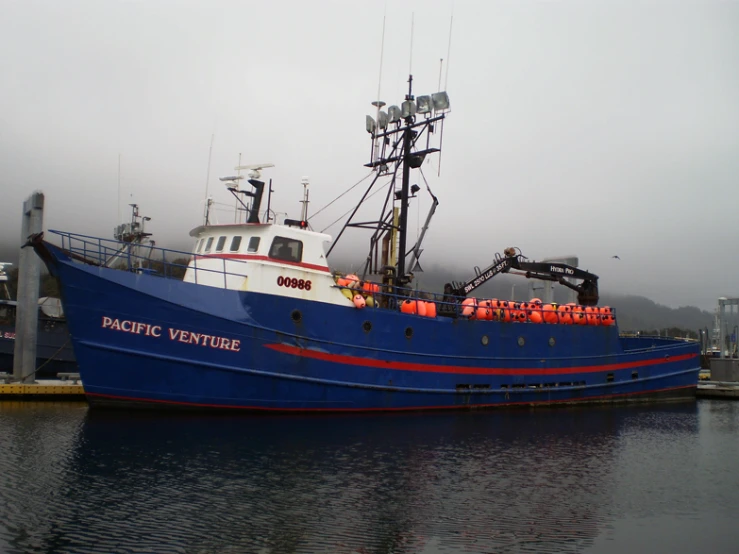 a boat that is sitting on the dock