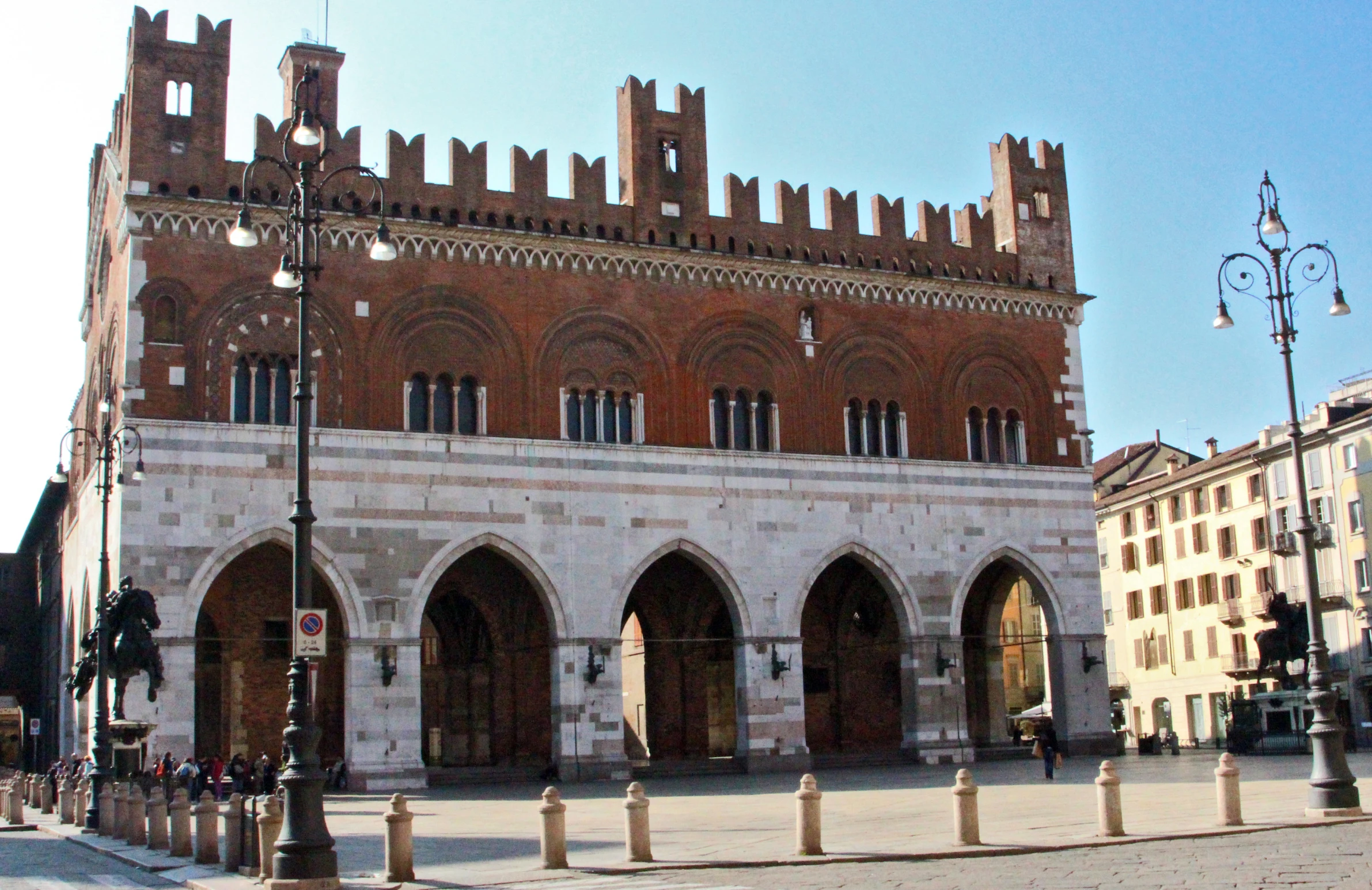 a tall building with arches and arched windows