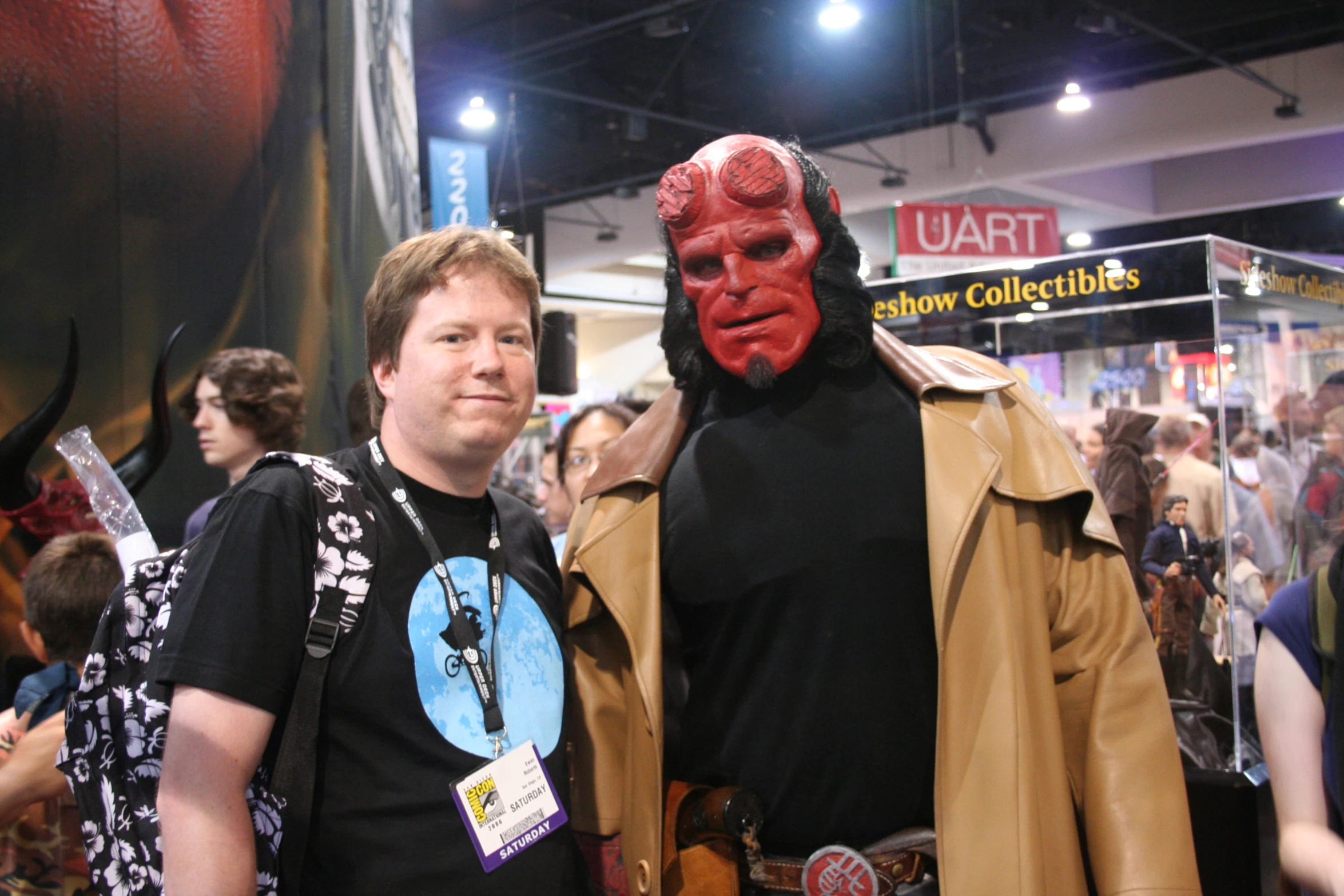 two men with costumes on are standing together