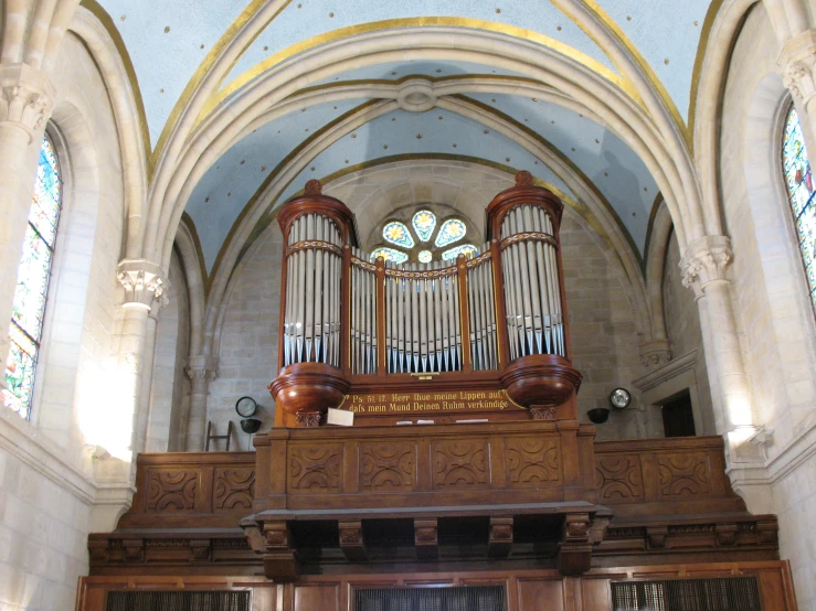 an organ with some wood in front of it