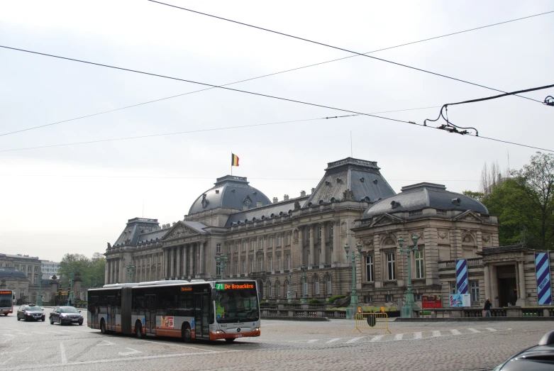 a tour bus parked on the street of a city