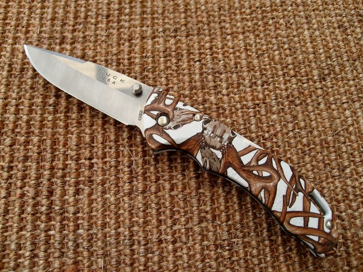 a close up of a knife on a table