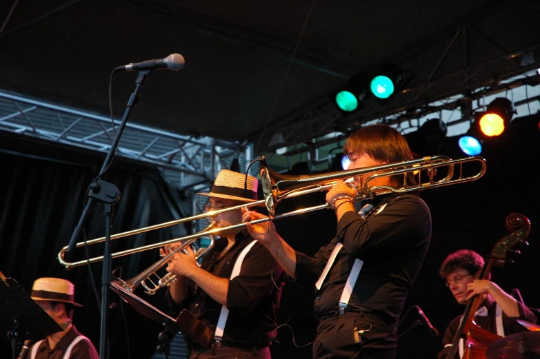 a band playing instruments at a concert