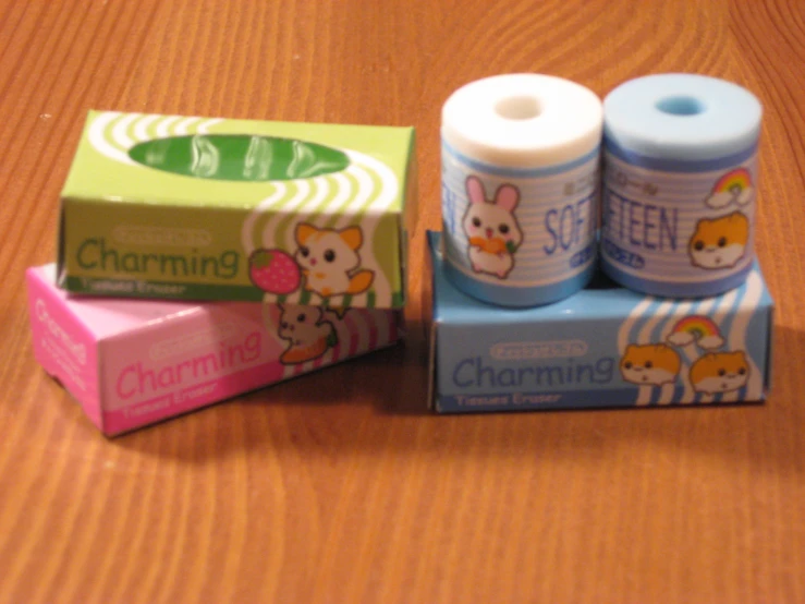 an assortment of tooth pastes, toothpaste and candy on the wooden surface