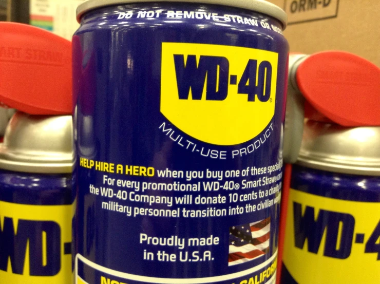 3 can of wd 40 on display for sale