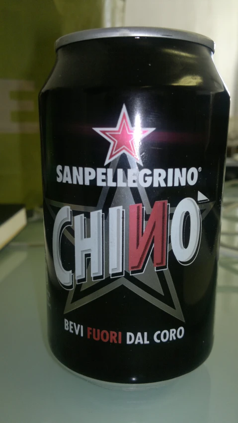 an empty can of chino beer on the table