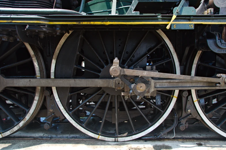 large wheels of an old fashioned steam locomotive