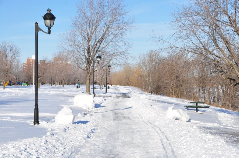 a street light is over and on the snow