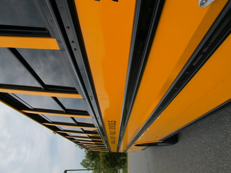 a school bus is stopped on the side of the road