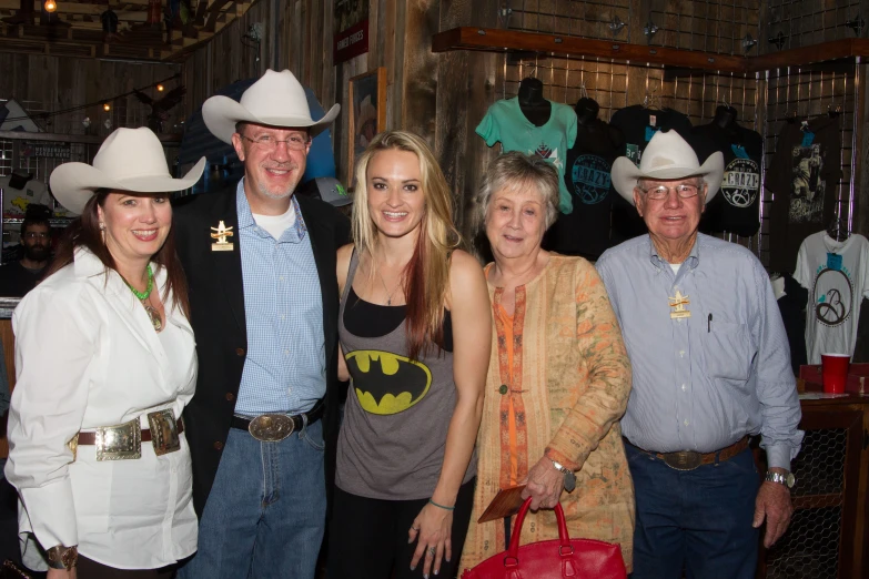 group of four people in costume standing together