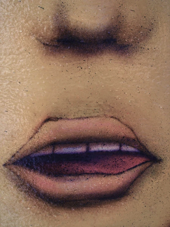 a woman's lips and mouth are covered in makeup