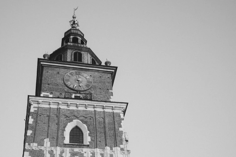 the clock tower is constructed to look like it is above the town square