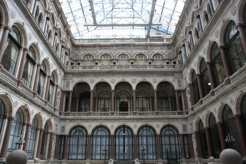 the interior of a large building with an arch style ceiling