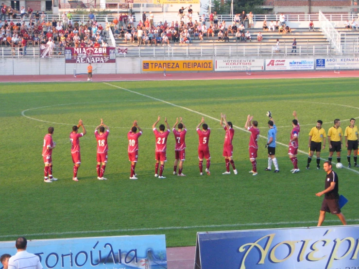 a soccer team is on the field during a game