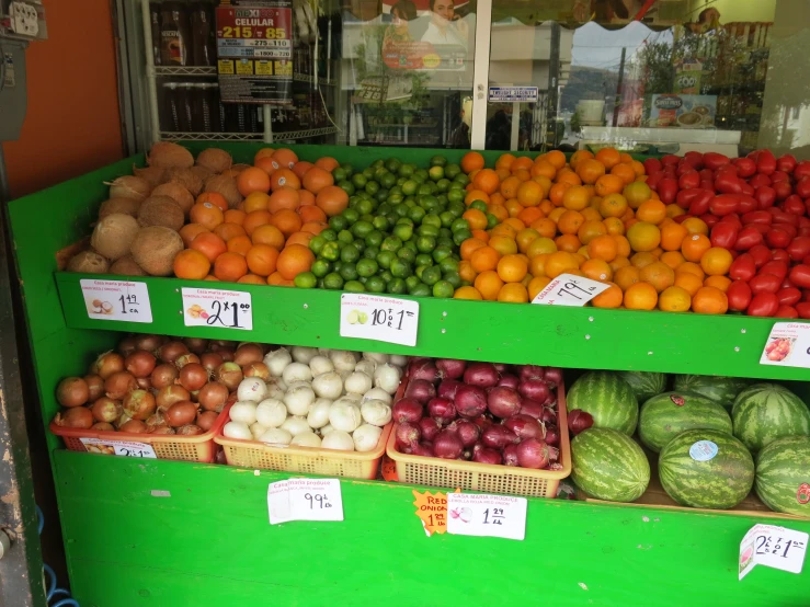 a display in a store with a large selection of vegetables