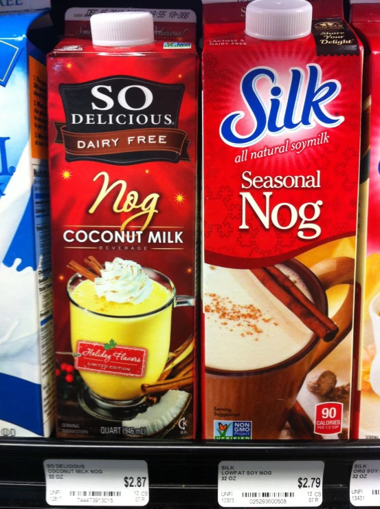 three milk drinks are on sale for $ 2 / 3