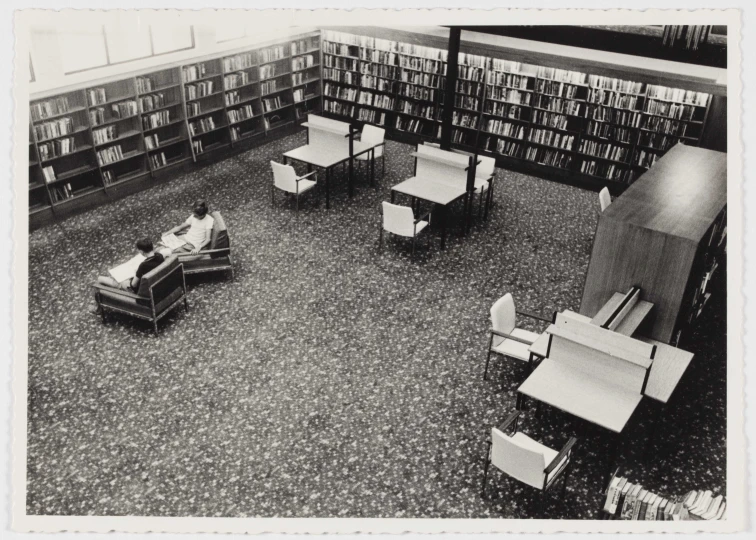 a couple of chairs and a table in a room