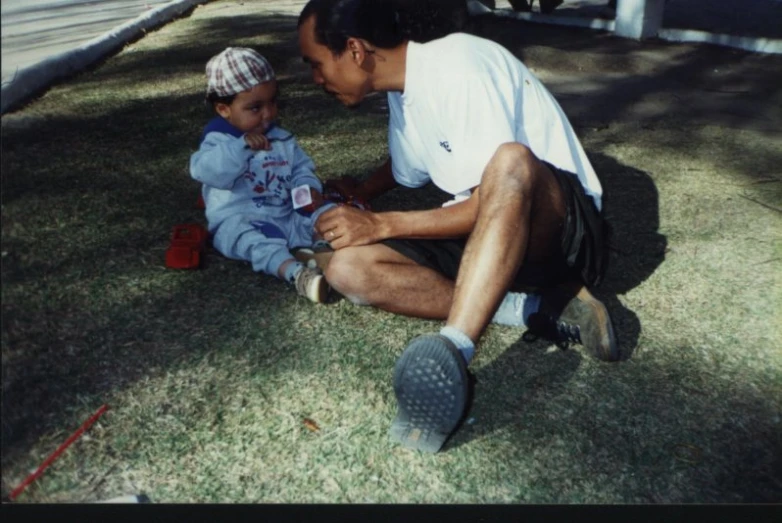 an image of man with child playing together