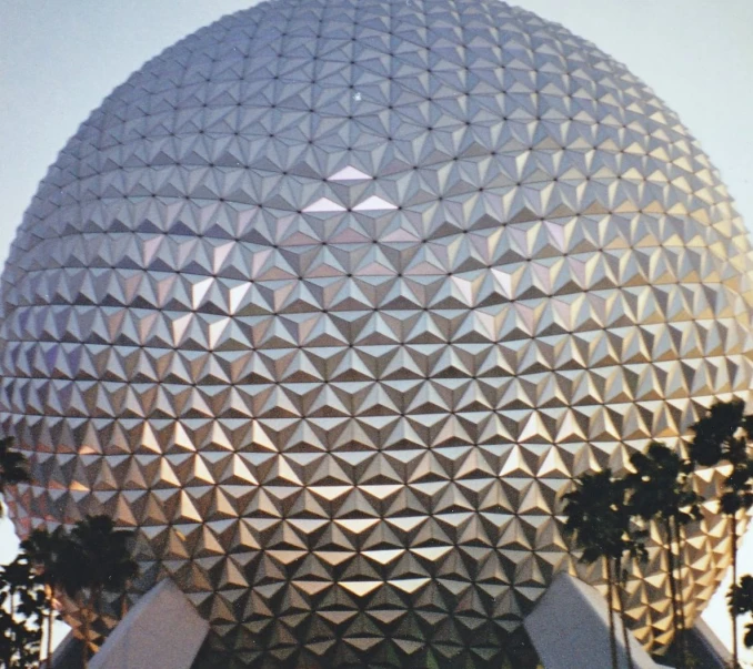 a ball with an odd shape is next to trees