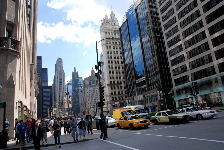 there is an image of people crossing the street in this city