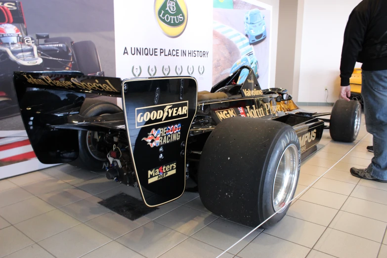 the side of an old race car with wheels