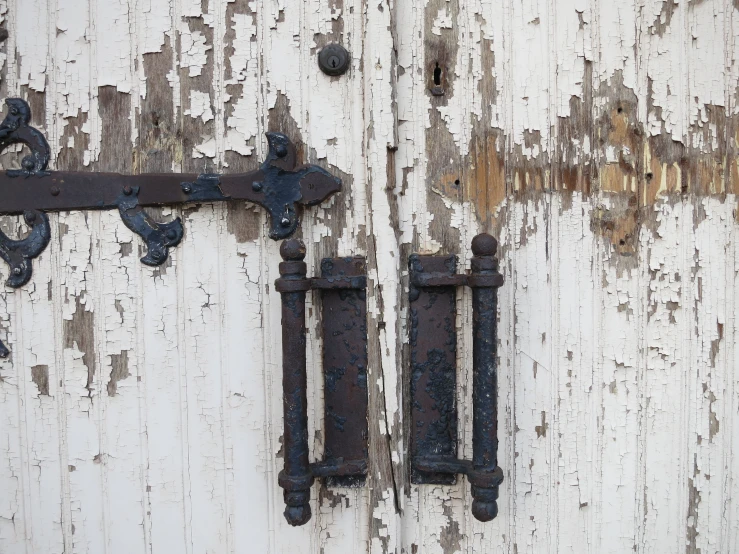 some old iron keys are hanging on the door