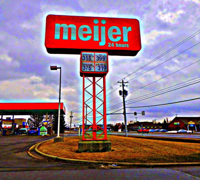 a red sign advertising a store is pictured