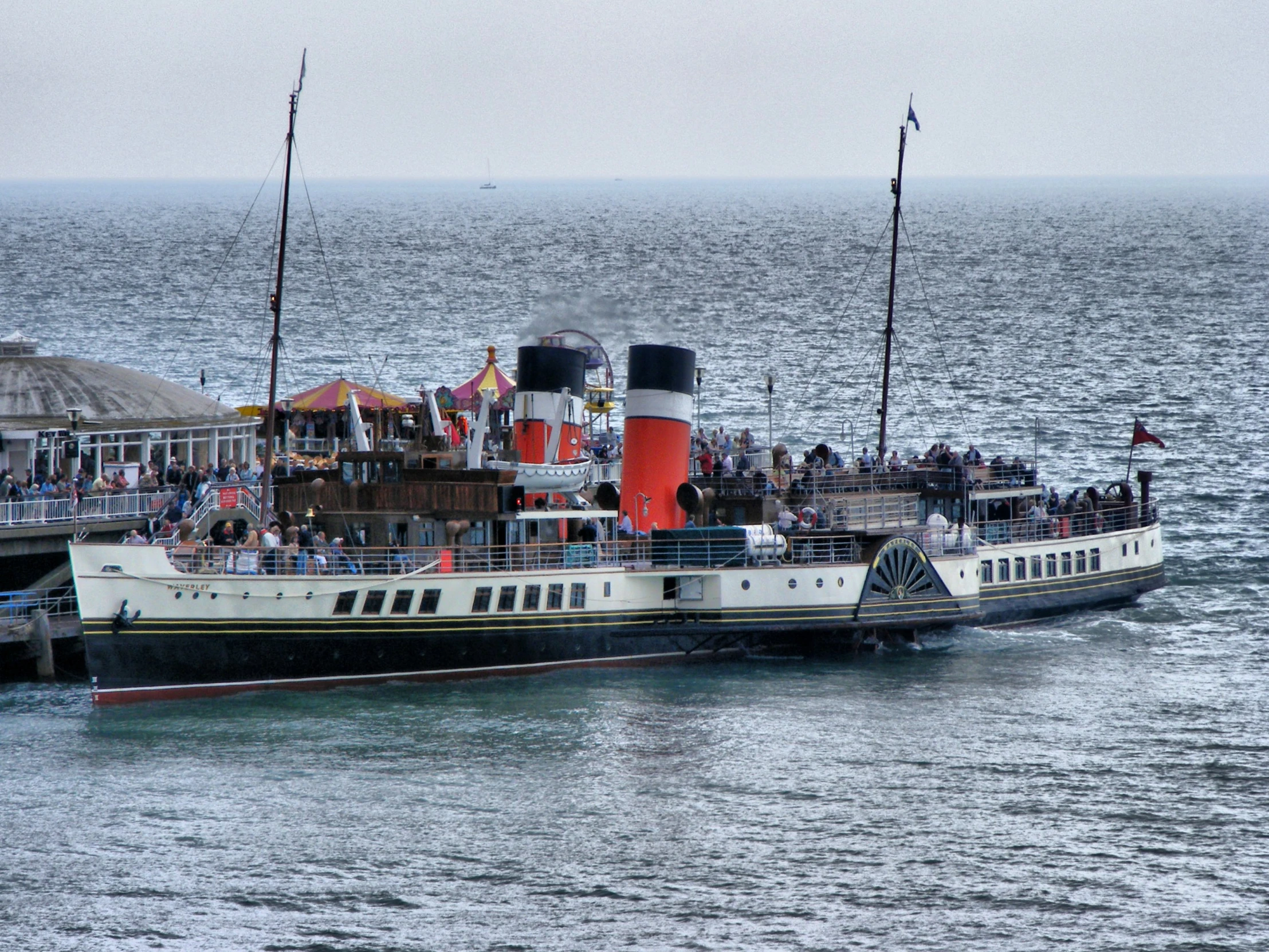 a large boat that has people on top of it