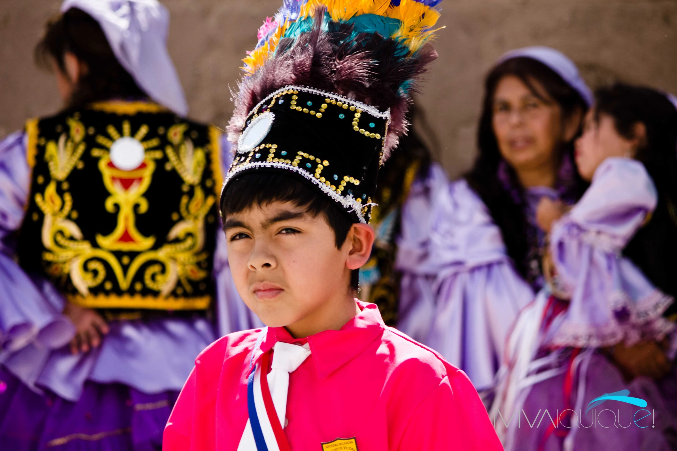 a small boy with a costume and a costume