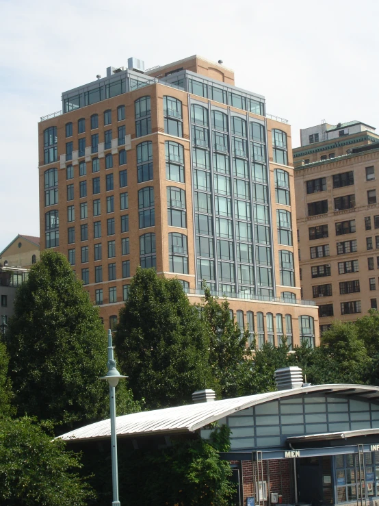 a very large building with several trees around it