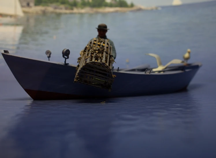 a man sitting in a boat next to sea birds